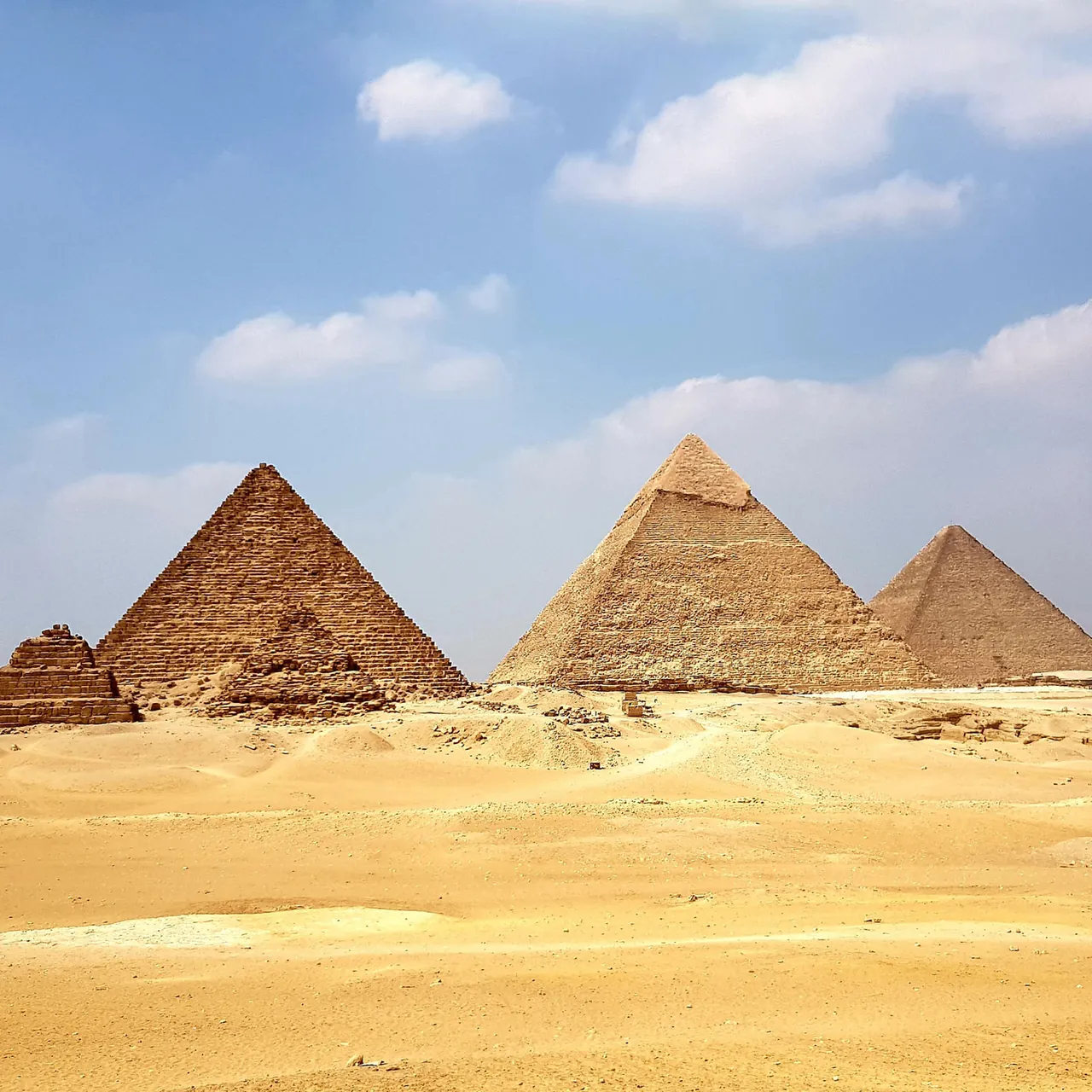 Pyramids of Giza under a clear Egyptian sky